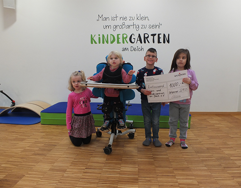 Donation cheque to the learning and support centre on the dyke
